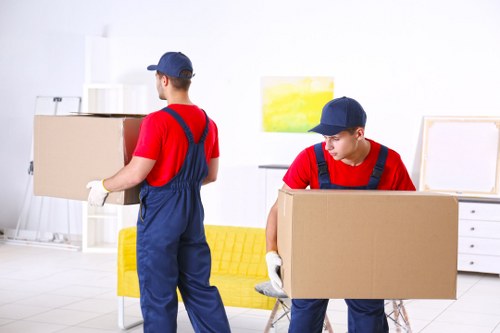 Furniture being loaded into a van for a Morden house move