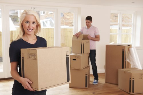 Household furniture and boxes being loaded for a move near Morden