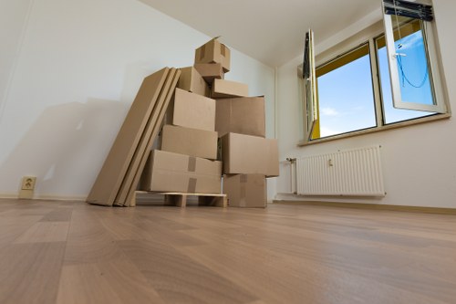 Packed boxes and furniture ready for transport during a house move