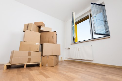 Packed boxes and furniture ready for house removals in Morden
