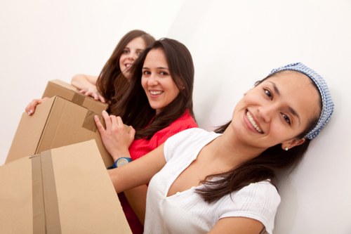 Packing boxes and furniture for a house removal in Morden