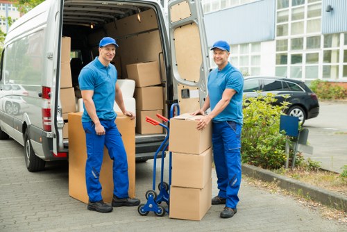 Local removal truck helping with a residential move in Morden