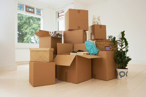 Moving day preparation items and packed boxes ready for house removals in Morden