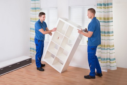 Staff conducting a risk assessment before a house move