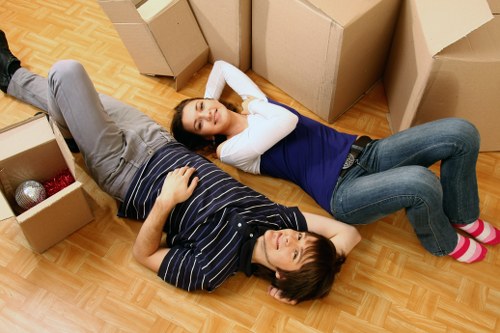 Commercial movers handling office equipment with care